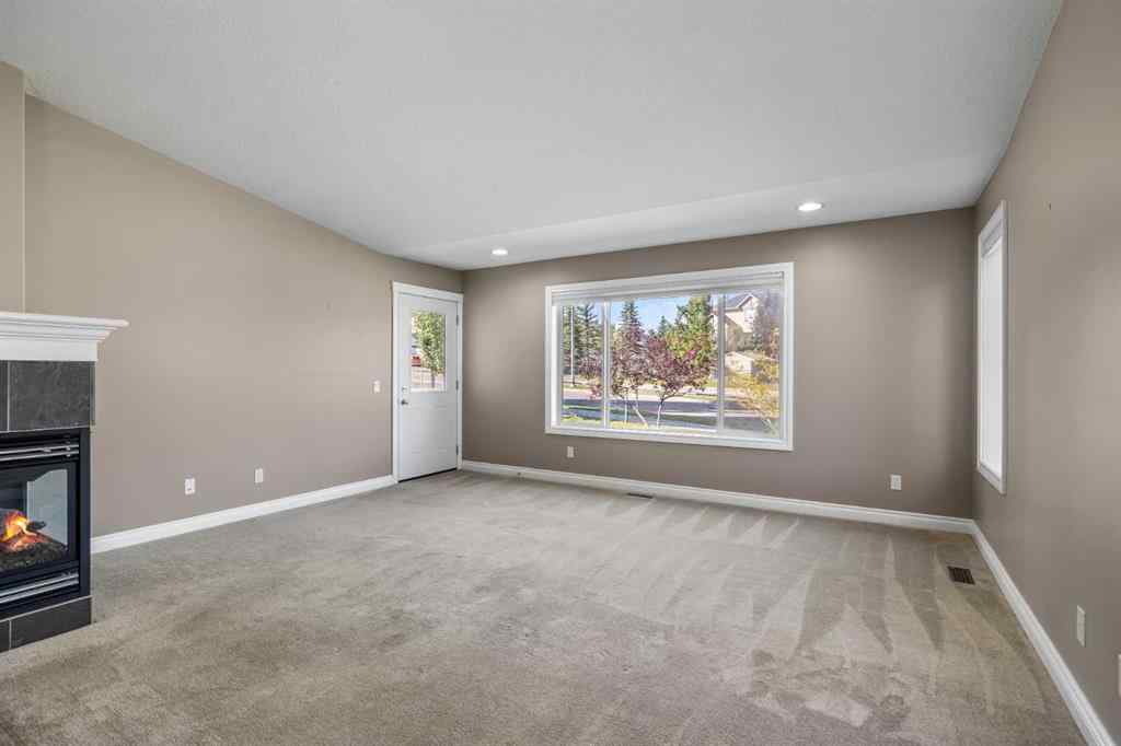 MLS® A2247451 - Unit #34 100 Sheep River Drive  in Sheep River Ridge Okotoks, Residential