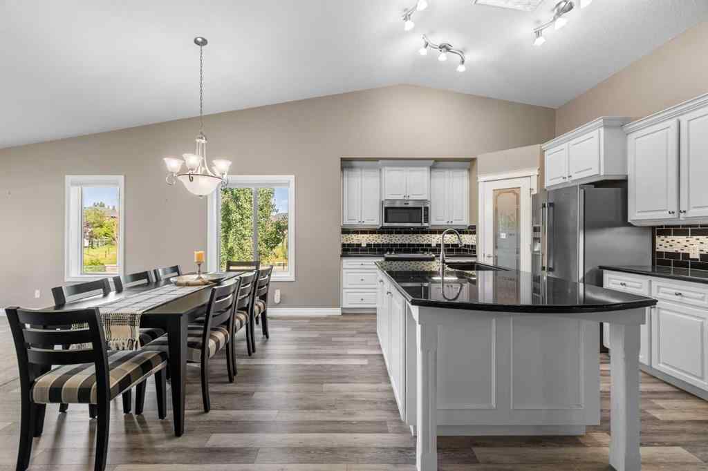 MLS® A2247451 - Unit #34 100 Sheep River Drive  in Sheep River Ridge Okotoks, Residential