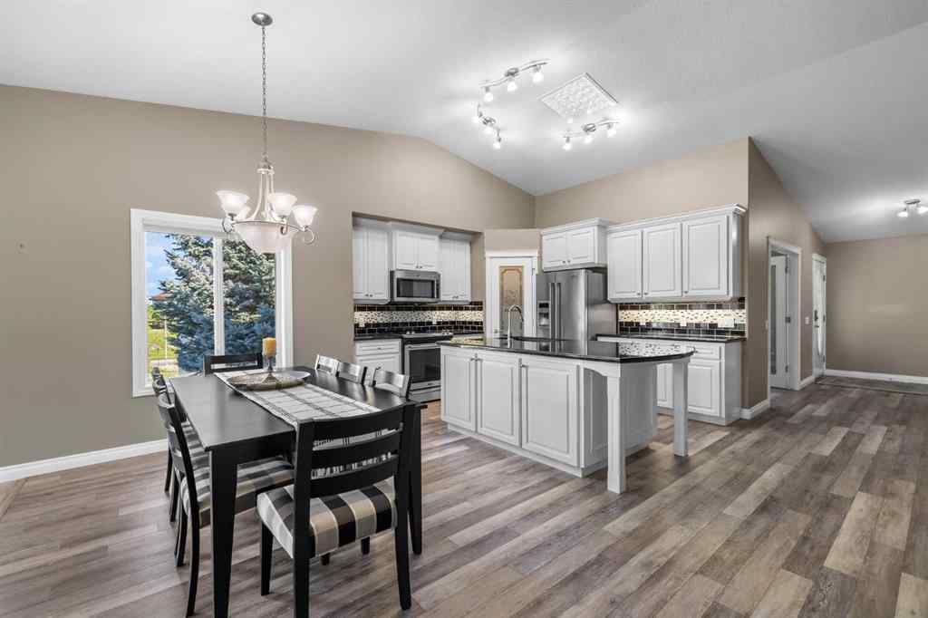 MLS® A2247451 - Unit #34 100 Sheep River Drive  in Sheep River Ridge Okotoks, Residential