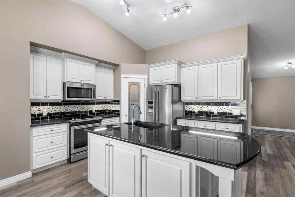 MLS® A2247451 - Unit #34 100 Sheep River Drive  in Sheep River Ridge Okotoks, Residential