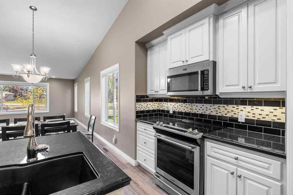 MLS® A2247451 - Unit #34 100 Sheep River Drive  in Sheep River Ridge Okotoks, Residential