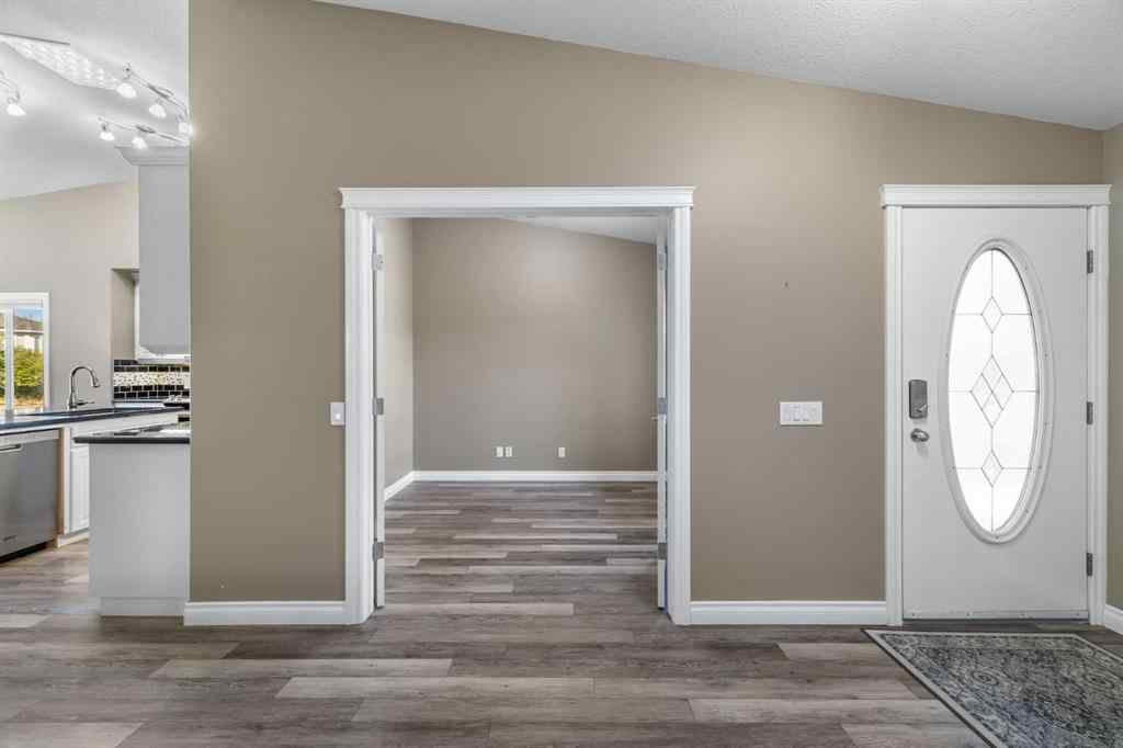 MLS® A2247451 - Unit #34 100 Sheep River Drive  in Sheep River Ridge Okotoks, Residential