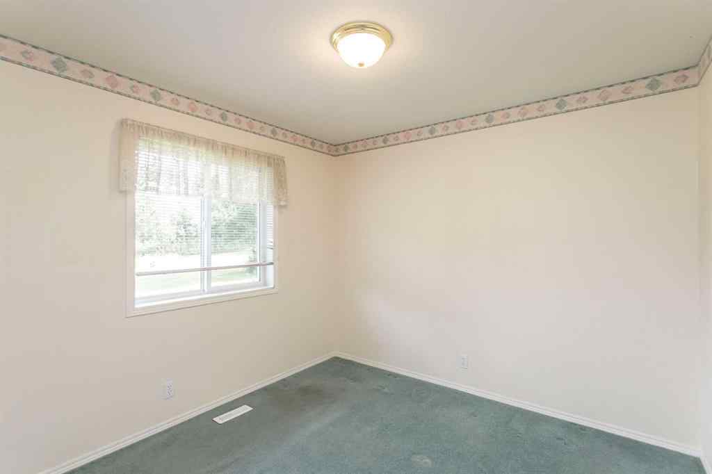 MLS® A2247460 - 1260036 Township Road 420   in Spruce Ridge Estates Rural Ponoka County, Residential