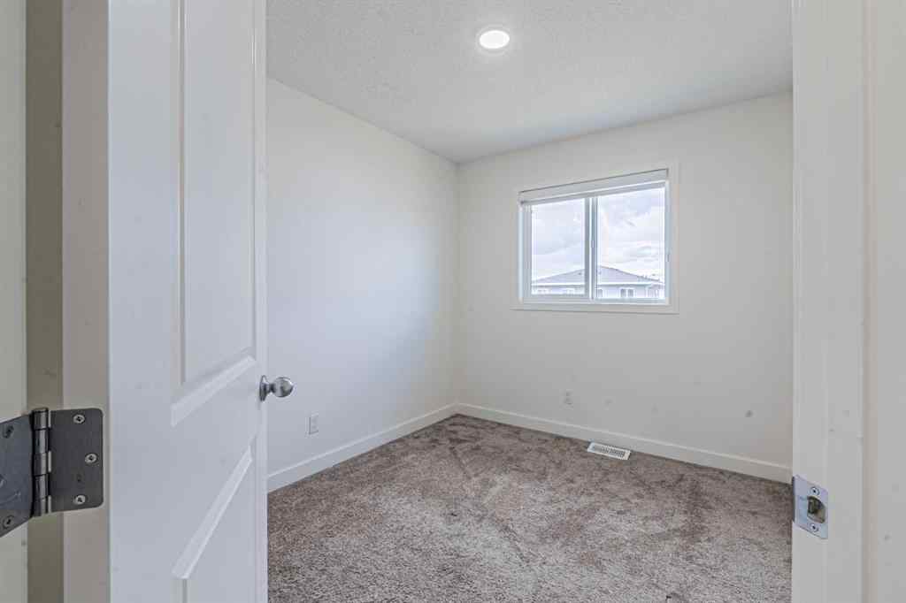 MLS® A2247465 - 652 Savanna Boulevard NE in Saddle Ridge Calgary, Residential