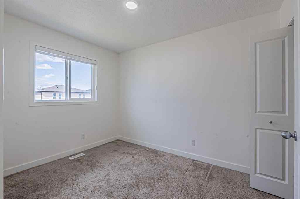 MLS® A2247465 - 652 Savanna Boulevard NE in Saddle Ridge Calgary, Residential