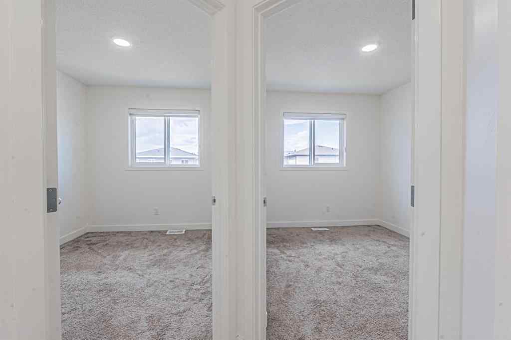 MLS® A2247465 - 652 Savanna Boulevard NE in Saddle Ridge Calgary, Residential