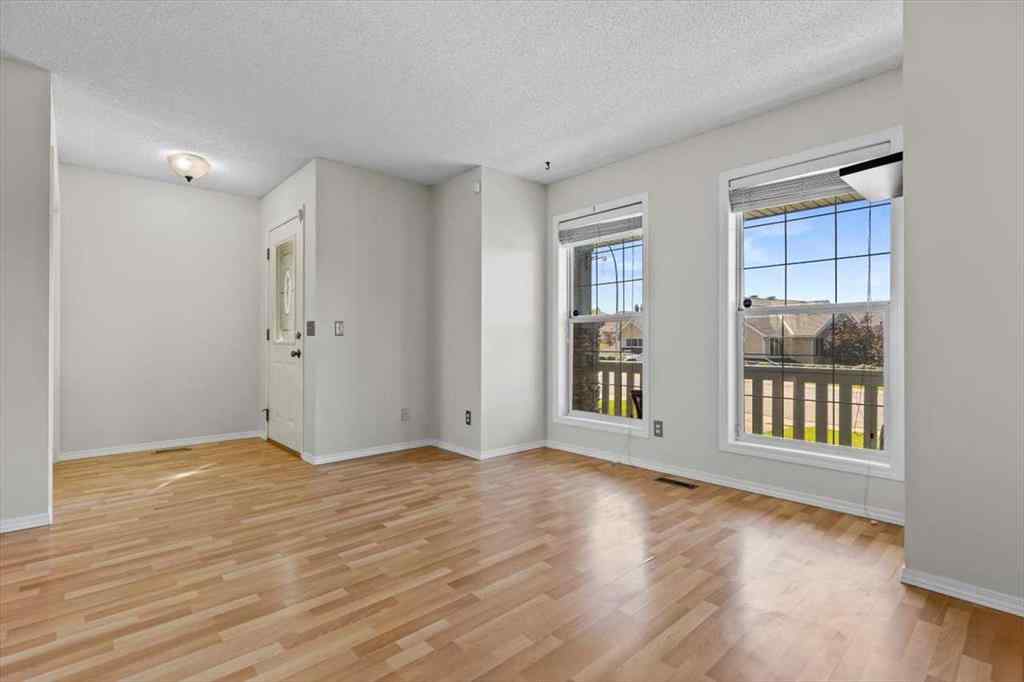 MLS® A2247480 - 911 Arbour Lake Road NW in Arbour Lake Calgary, Residential