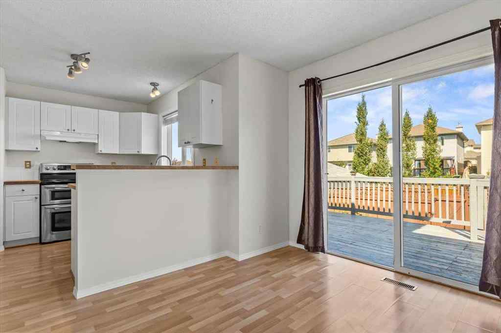 MLS® A2247480 - 911 Arbour Lake Road NW in Arbour Lake Calgary, Residential