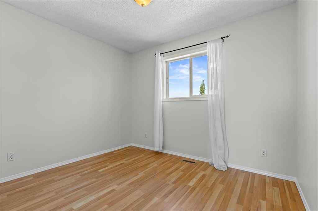 MLS® A2247480 - 911 Arbour Lake Road NW in Arbour Lake Calgary, Residential
