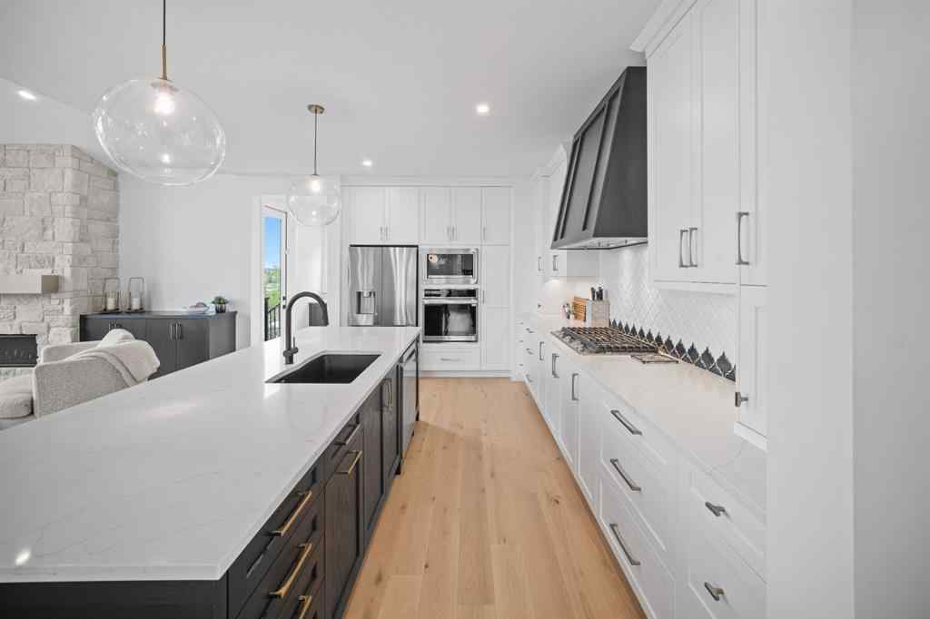 MLS® A2247514 - 60 Pike Court  in Harmony Rural Rocky View County, Residential