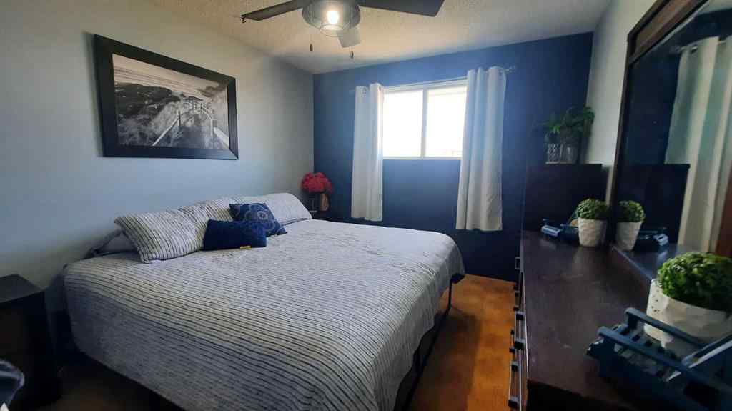 MLS® A2247521 - 1005 2 Street SE in Huntington Drumheller, Residential