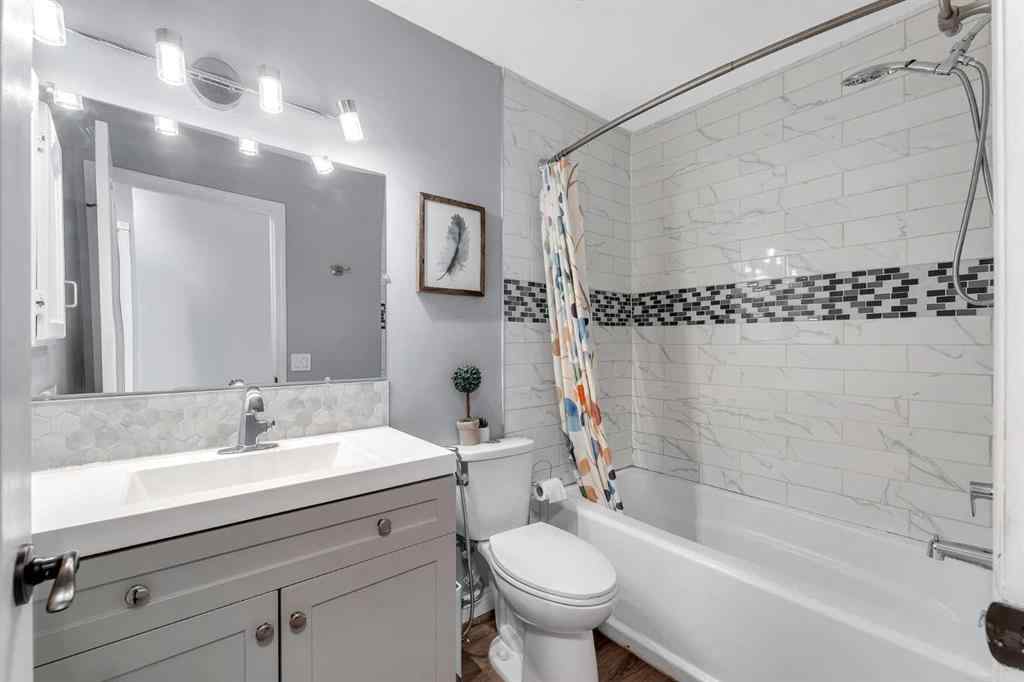 MLS® A2247544 - 63 Erin Green Way SE in Erin Woods Calgary, Residential
