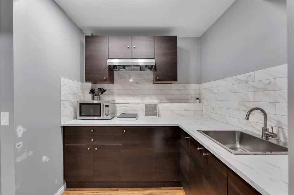 MLS® A2247544 - 63 Erin Green Way SE in Erin Woods Calgary, Residential