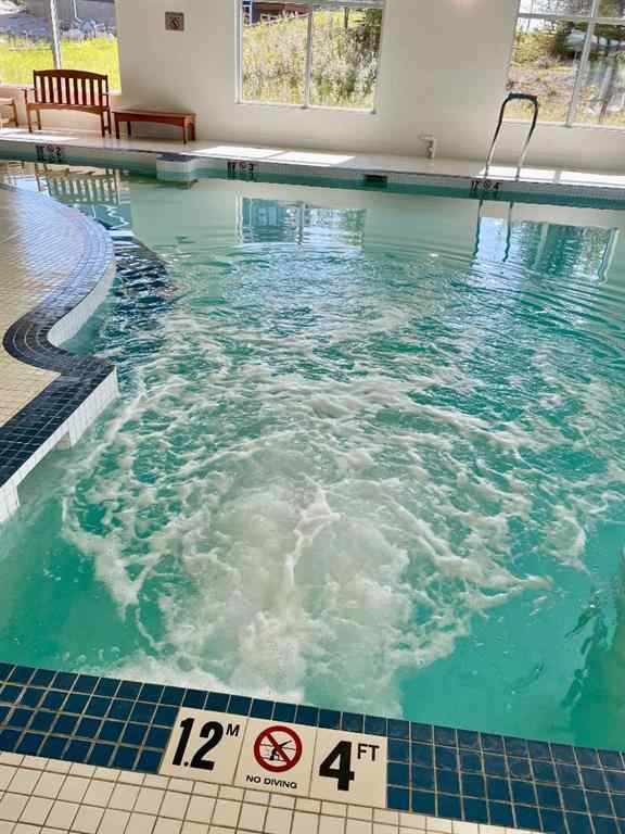 MLS® A2247550 - 249 Cottageclub Crescent  in Cottage Club at Ghost Lake Rural Rocky View County, Residential