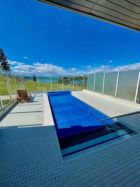 MLS® A2247550 - 249 Cottageclub Crescent  in Cottage Club at Ghost Lake Rural Rocky View County, Residential