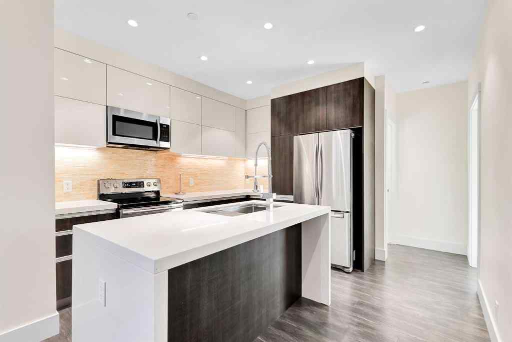 MLS® A2247558 - Unit #203 108 13 Avenue NE in Crescent Heights Calgary, Residential