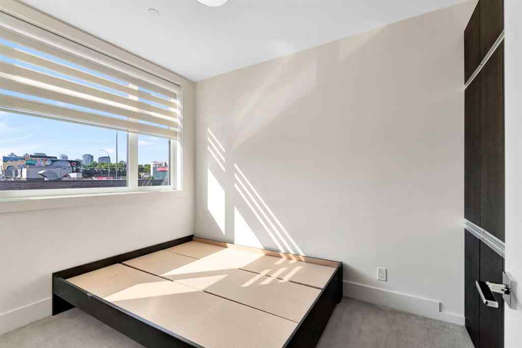 MLS® A2247558 - Unit #203 108 13 Avenue NE in Crescent Heights Calgary, Residential