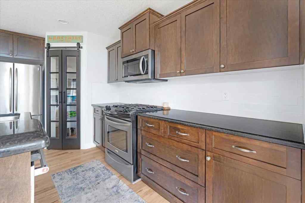 MLS® A2247564 - 1617 High Park Drive NW in Highwood Village High River, Residential