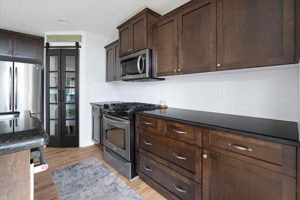 MLS® A2247564 - 1617 High Park Drive NW in Highwood Village High River, Residential