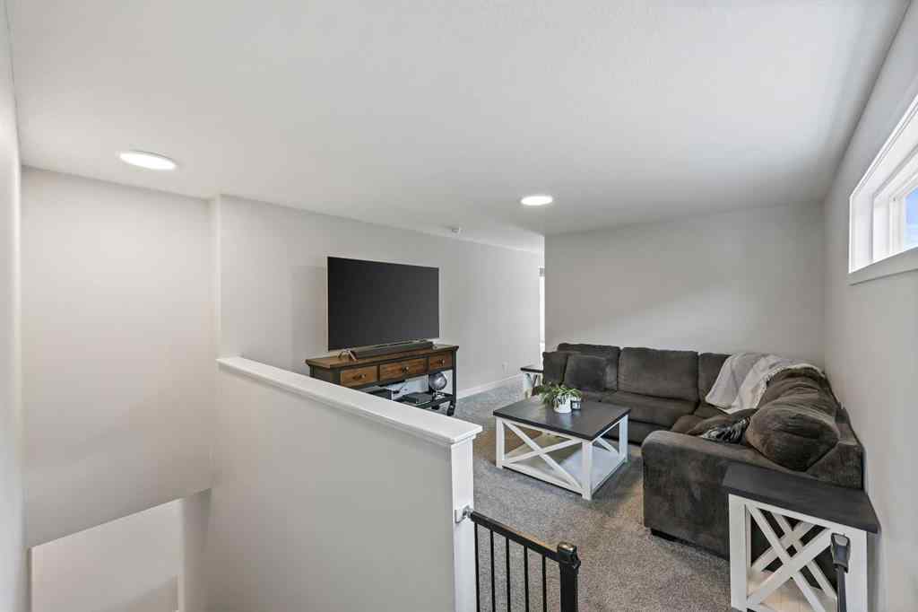 MLS® A2247575 - 83 Wolf Creek Rise SE in Wolf Willow Calgary, Residential