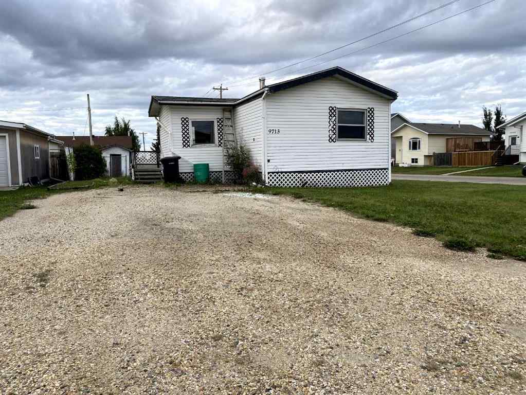 MLS® A2247576 - 9713 102 Avenue  in N/A Clairmont, Residential