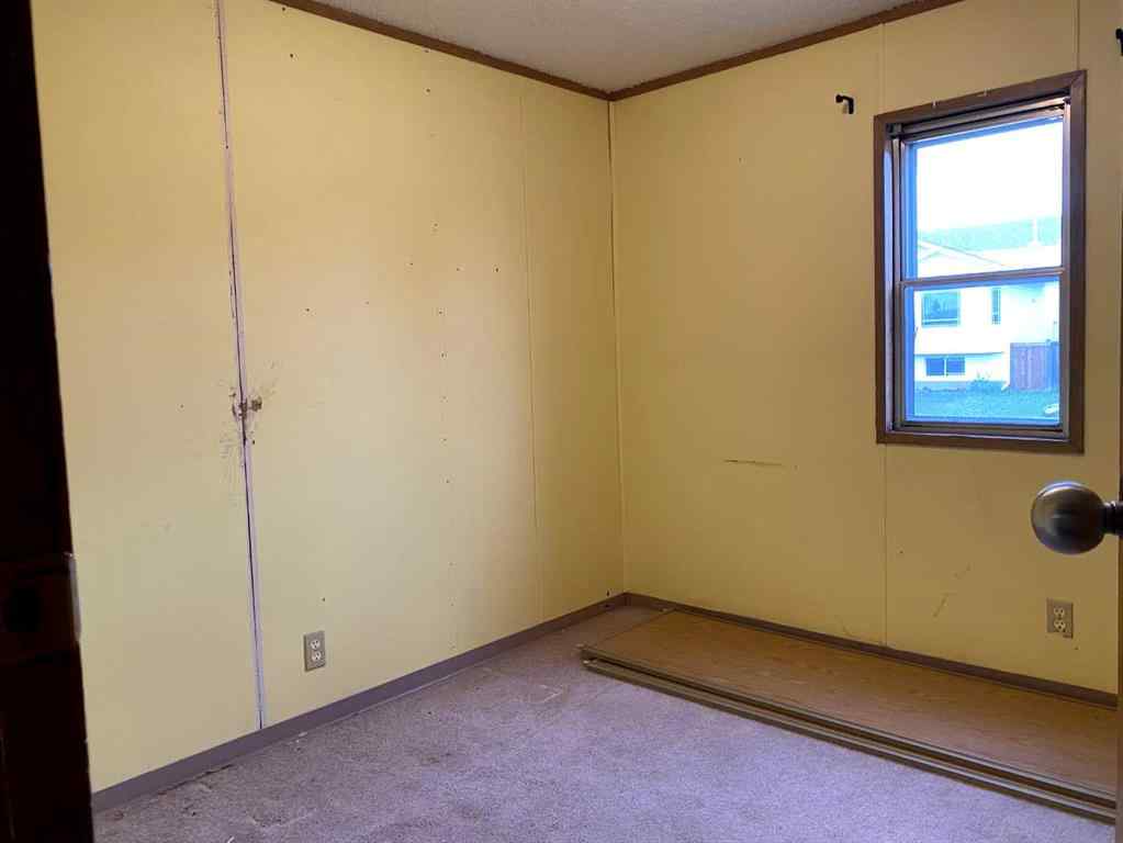 MLS® A2247576 - 9713 102 Avenue  in N/A Clairmont, Residential