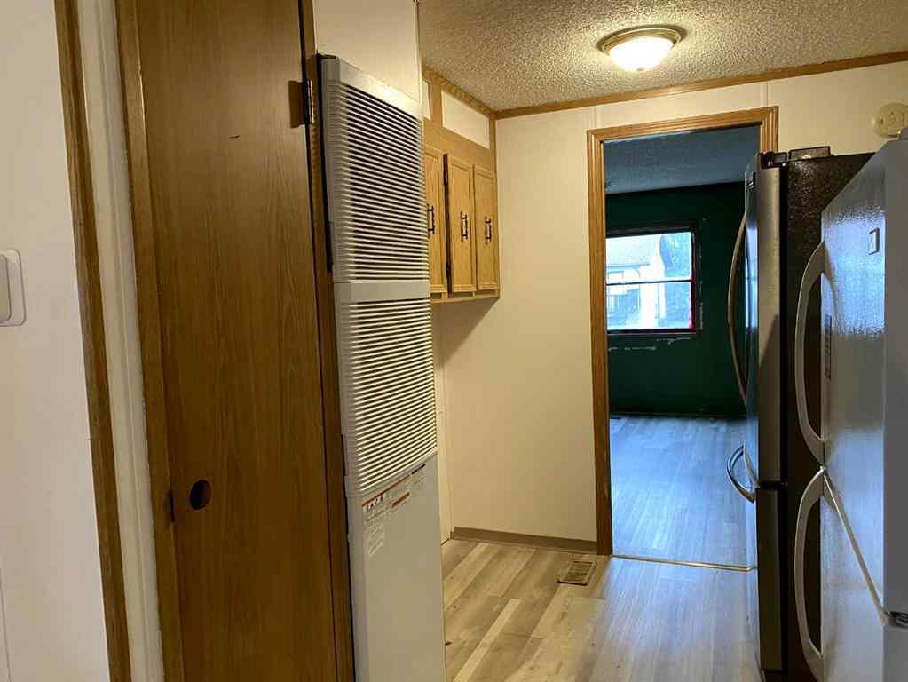 MLS® A2247576 - 9713 102 Avenue  in N/A Clairmont, Residential