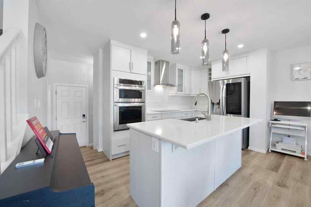 MLS® A2247600 - 19627 Sheriff King Street SW in Yorkville Calgary, Residential