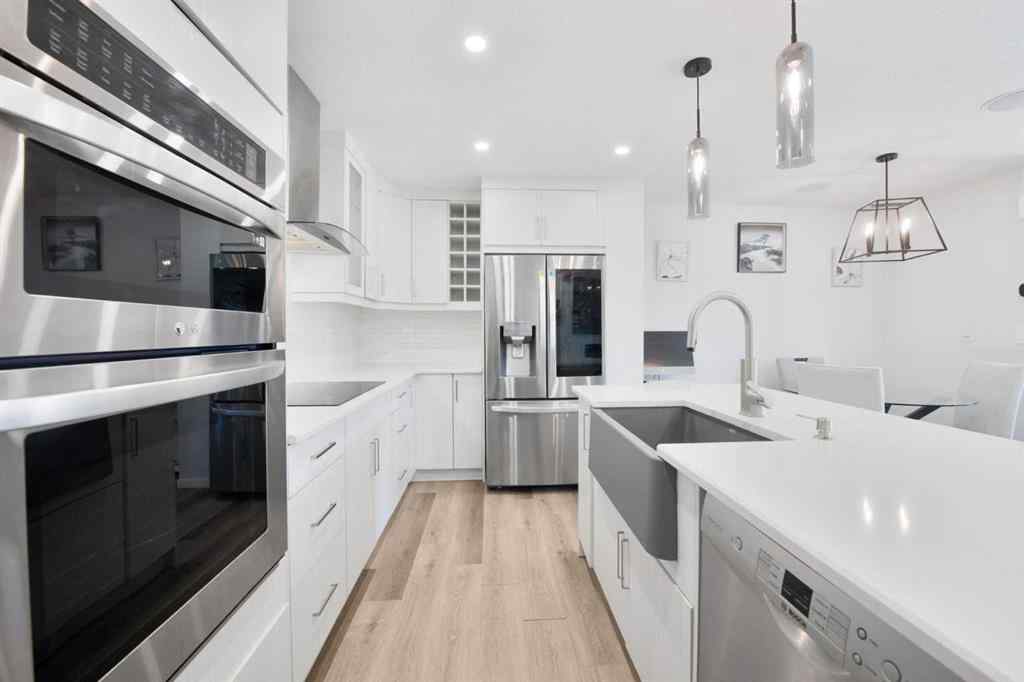 MLS® A2247600 - 19627 Sheriff King Street SW in Yorkville Calgary, Residential