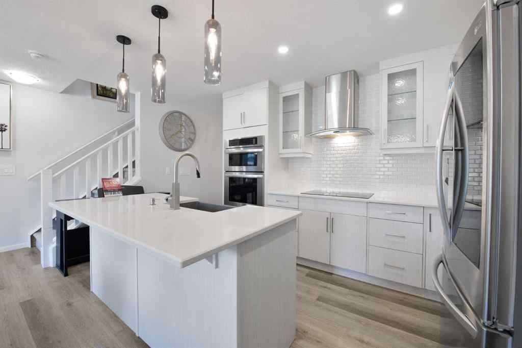 MLS® A2247600 - 19627 Sheriff King Street SW in Yorkville Calgary, Residential