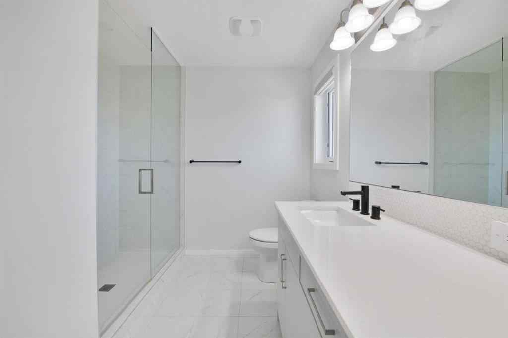 MLS® A2247600 - 19627 Sheriff King Street SW in Yorkville Calgary, Residential