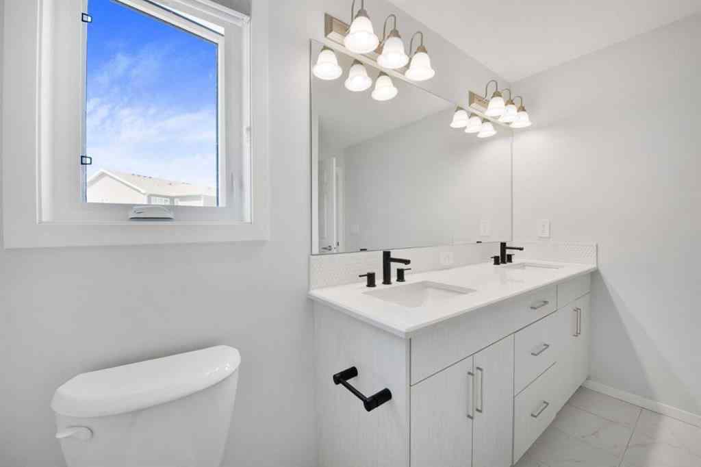 MLS® A2247600 - 19627 Sheriff King Street SW in Yorkville Calgary, Residential