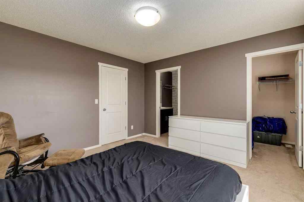 MLS® A2247610 - 44 Sunvalley Road  in Sunset Ridge Cochrane, Residential
