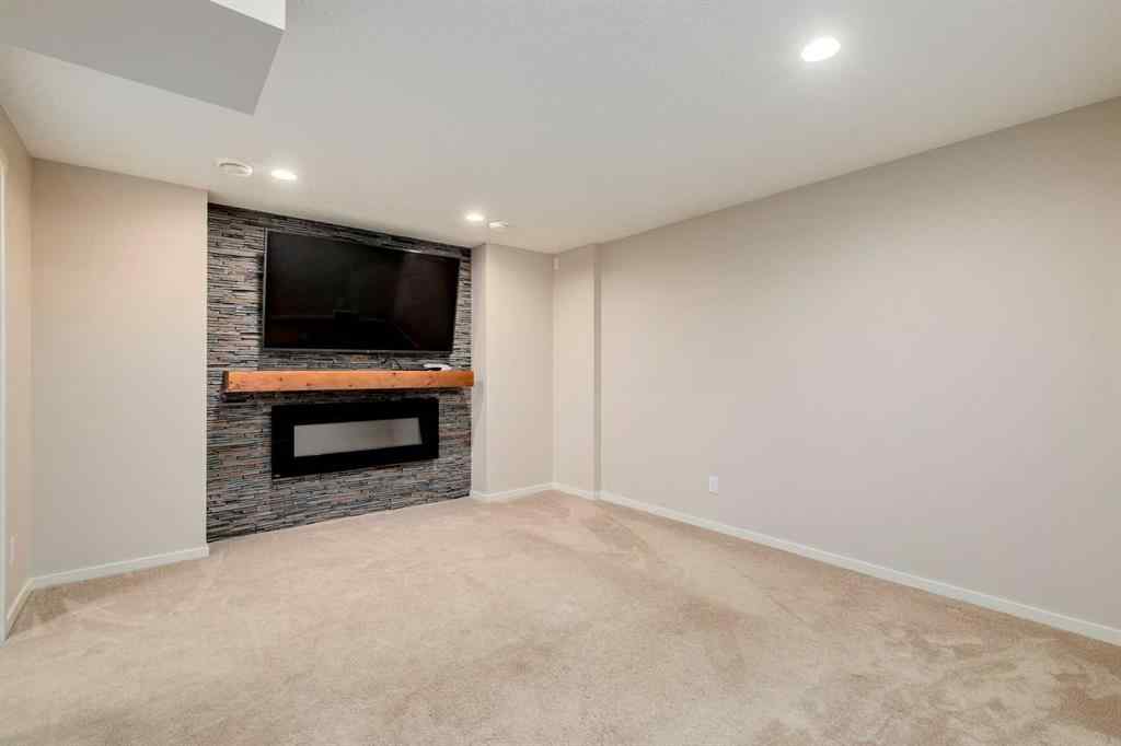 MLS® A2247610 - 44 Sunvalley Road  in Sunset Ridge Cochrane, Residential