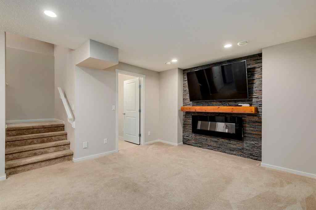 MLS® A2247610 - 44 Sunvalley Road  in Sunset Ridge Cochrane, Residential