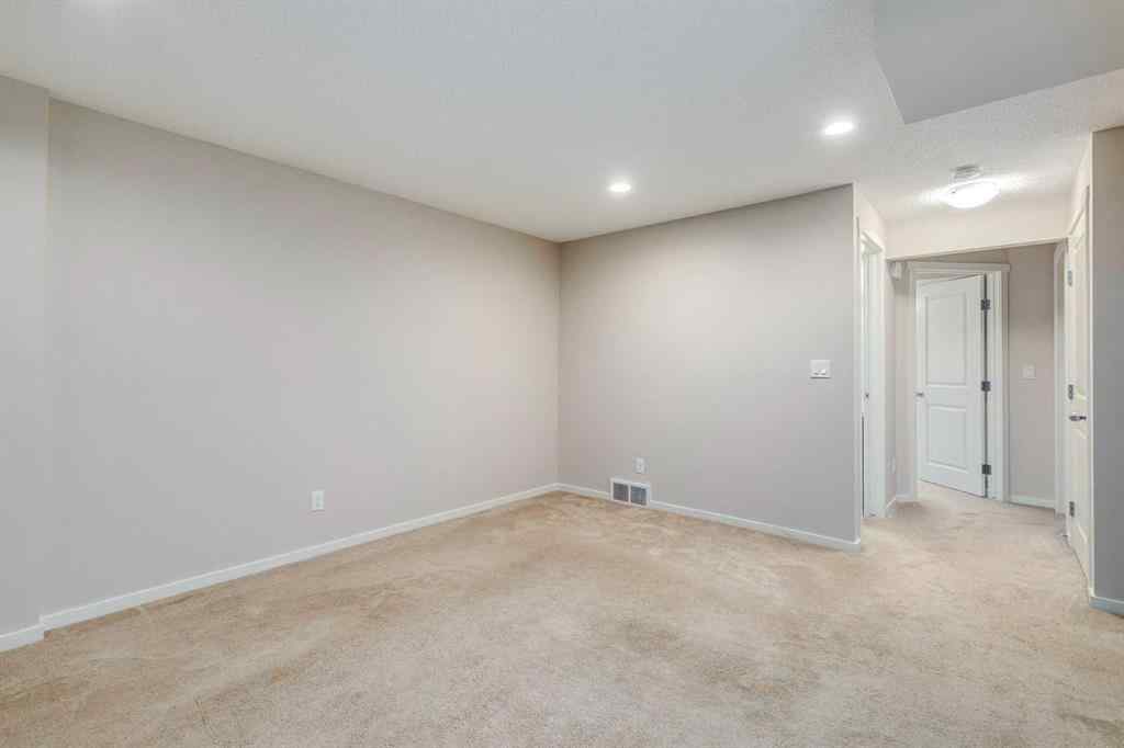 MLS® A2247610 - 44 Sunvalley Road  in Sunset Ridge Cochrane, Residential