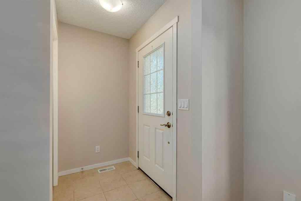MLS® A2247610 - 44 Sunvalley Road  in Sunset Ridge Cochrane, Residential