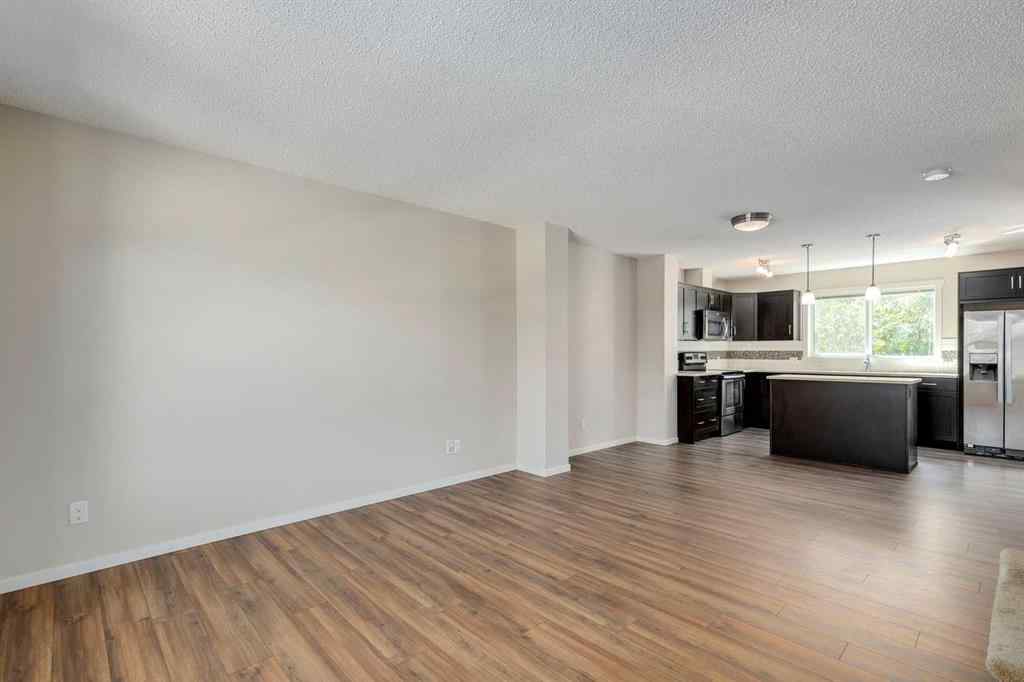 MLS® A2247610 - 44 Sunvalley Road  in Sunset Ridge Cochrane, Residential