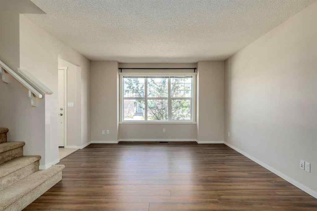 MLS® A2247610 - 44 Sunvalley Road  in Sunset Ridge Cochrane, Residential