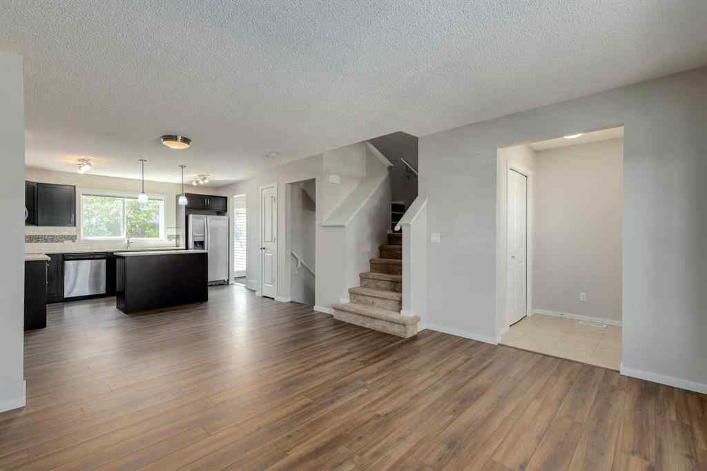 MLS® A2247610 - 44 Sunvalley Road  in Sunset Ridge Cochrane, Residential