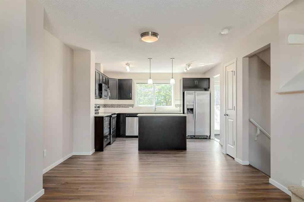 MLS® A2247610 - 44 Sunvalley Road  in Sunset Ridge Cochrane, Residential