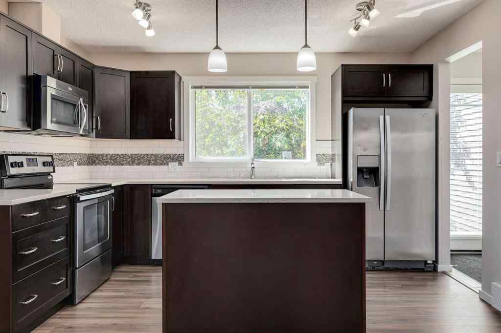 MLS® A2247610 - 44 Sunvalley Road  in Sunset Ridge Cochrane, Residential