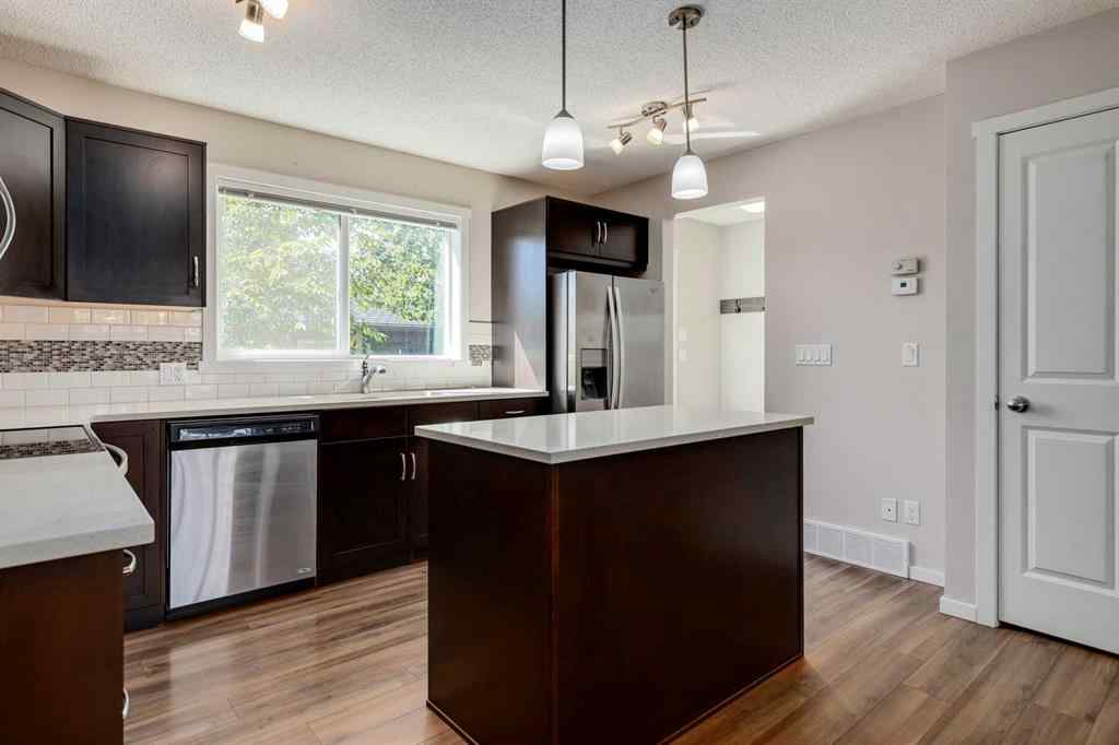 MLS® A2247610 - 44 Sunvalley Road  in Sunset Ridge Cochrane, Residential