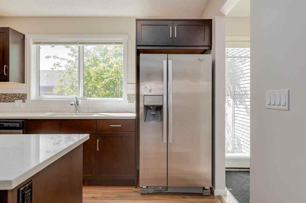 MLS® A2247610 - 44 Sunvalley Road  in Sunset Ridge Cochrane, Residential