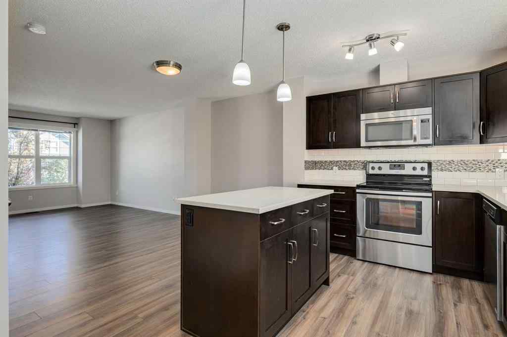 MLS® A2247610 - 44 Sunvalley Road  in Sunset Ridge Cochrane, Residential