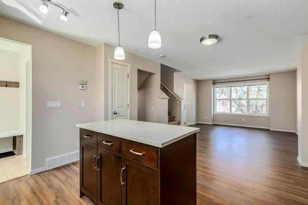 MLS® A2247610 - 44 Sunvalley Road  in Sunset Ridge Cochrane, Residential