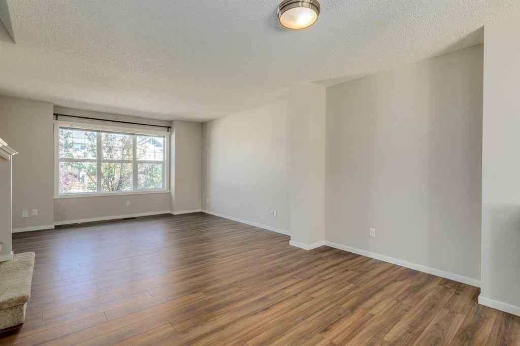 MLS® A2247610 - 44 Sunvalley Road  in Sunset Ridge Cochrane, Residential