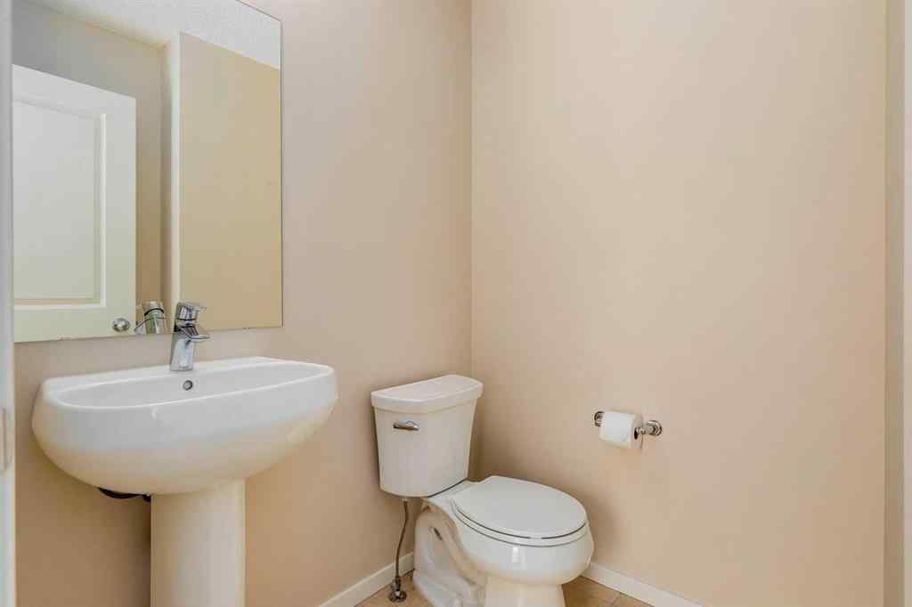 MLS® A2247610 - 44 Sunvalley Road  in Sunset Ridge Cochrane, Residential