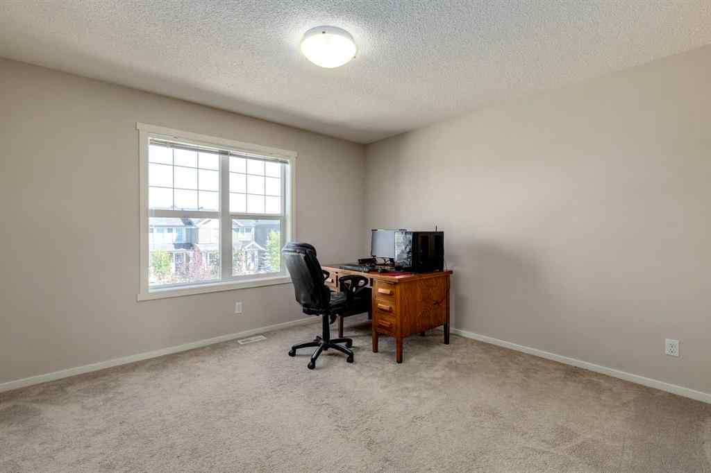 MLS® A2247610 - 44 Sunvalley Road  in Sunset Ridge Cochrane, Residential