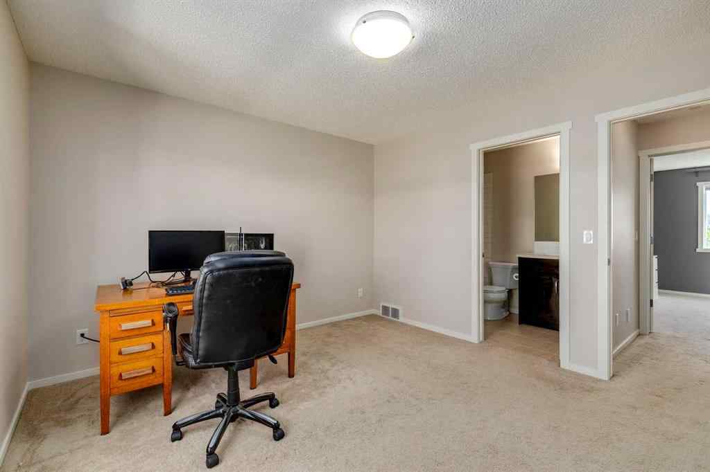 MLS® A2247610 - 44 Sunvalley Road  in Sunset Ridge Cochrane, Residential